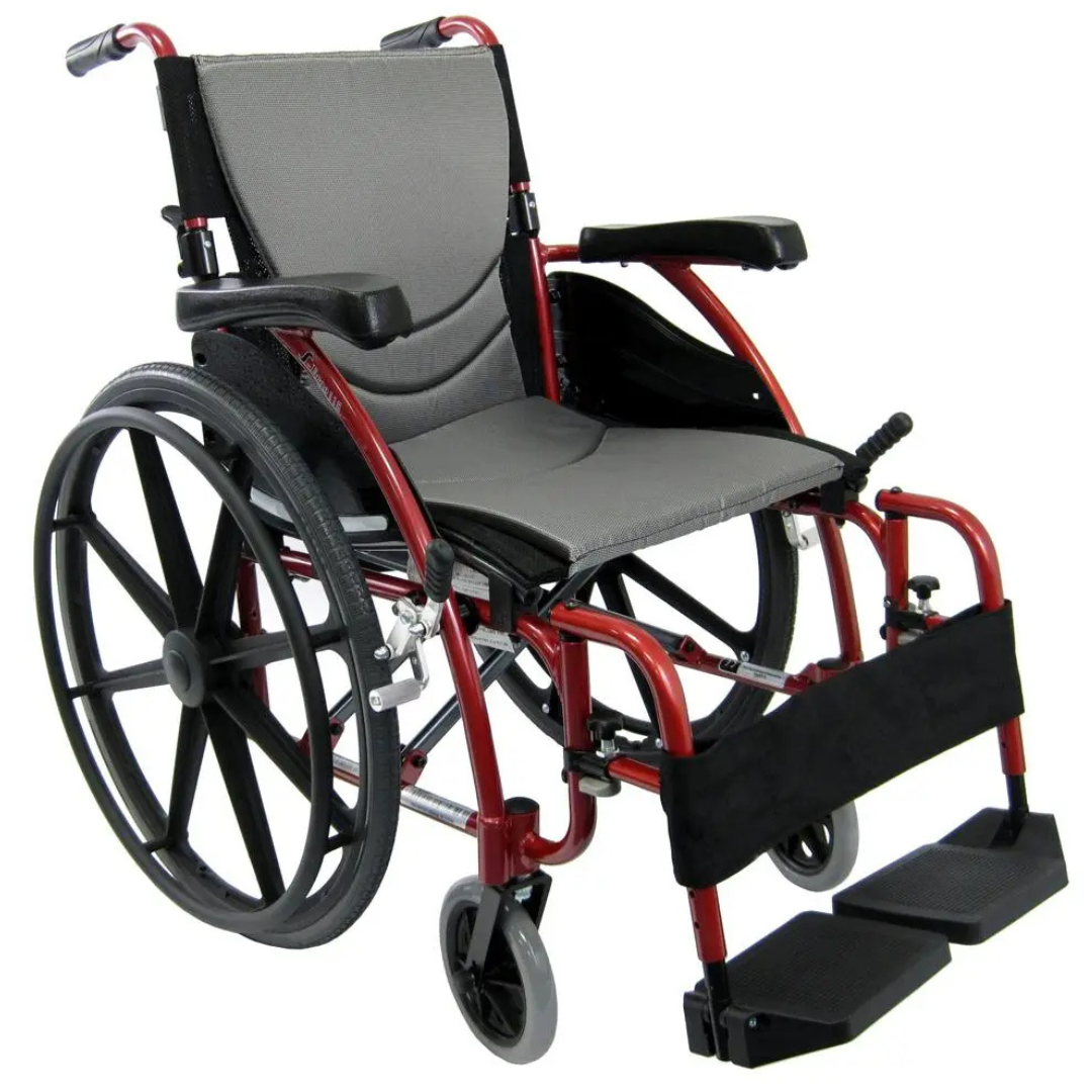The Karman S-Ergo 115 Ultra Lightweight Ergonomic Wheelchair weighs just 25 lbs and offers a red and black frame with a cushioned gray seat and backrest. It includes ergonomic armrests, footrests, and large rear wheels for easy maneuverability.